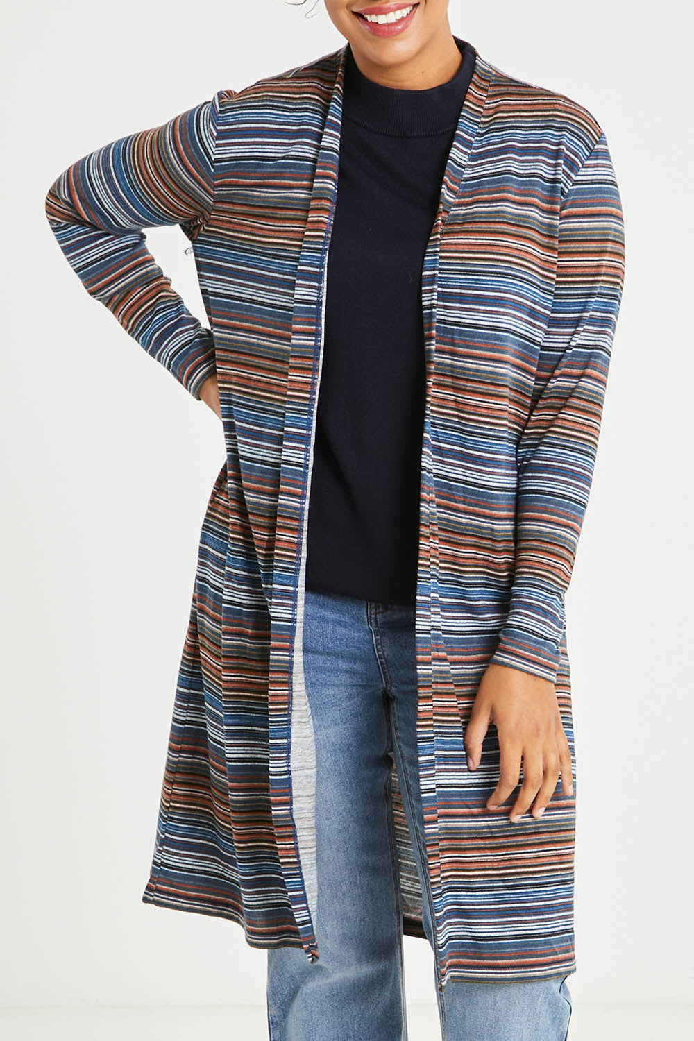 Model Noli wearing size 14 of The Striped Edge To Edge Knit Cardigan in colour Denim (Blue), from the front, cropped image