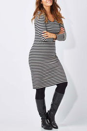 Model Laura wearing size 12 of The Everyday Midi Dress in colour BlackGrey (Grey), from the front, cropped image