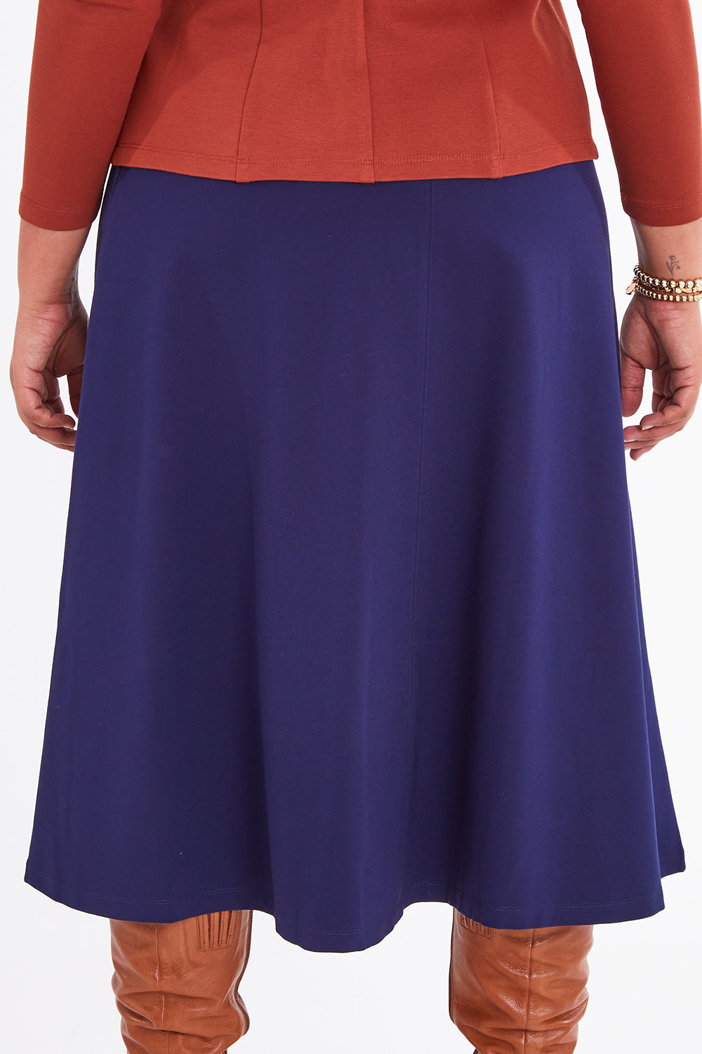 Model Anucia wearing size 14 of The Fit And Flare Ponte Skirt in colour Frenchnavy (Blue), from the back