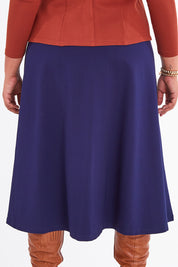 Model Anucia wearing size 14 of The Fit And Flare Ponte Skirt in colour Frenchnavy (Blue), from the back