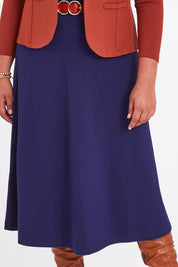 Model Anucia wearing size 14 of The Fit And Flare Ponte Skirt in colour Frenchnavy (Blue), from the front, cropped image