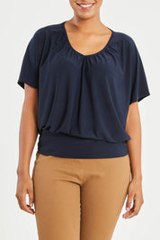 Model Noli wearing size 14 of The Recycled V Neck Wide Band Tee in colour Navy (Blue), from the front, cropped image