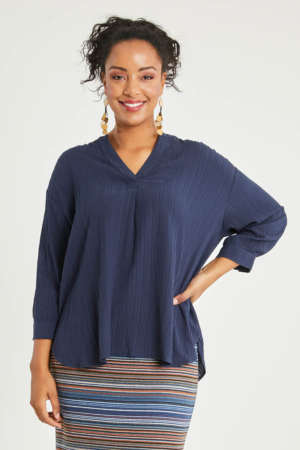 Model Noli wearing size 14 of The Nehru Collar Textured Top in colour Navy (Blue), from the front, cropped image