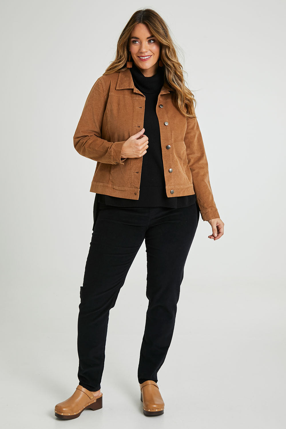 Model Laura wearing size 14 of The Cord Casual Jacket in colour Camel, from the front, showing the whole outfit