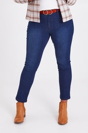 Model Anucia wearing size 14 of The Contour Jean in colour Darkdenim (Blue), from the front, cropped image