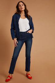 Model Madeline wearing size 10 of The Contour Jean in colour Darkdenim (Blue), from the front, showing the whole outfit