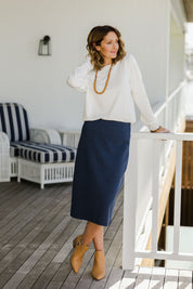 Model Emma wearing size 10 of The Ponte Jacquard Skirt in colour Navy (Blue), from the front, showing the whole outfit