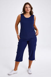 Model Monique wearing size 14 of The Everyday Cropped Cargo Pant in colour Frenchblue (Blue), from the front, showing the whole outfit
