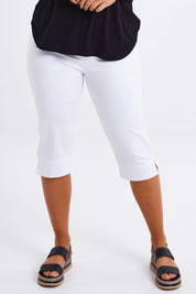 Model Monique wearing size 14 of The Cotton Blend 3/4 Pant in colour White (White), from the front, cropped image