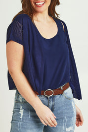 Model Jane wearing size L of The Short Sleeve Shrug in colour Clasicnavy (Blue), from the front, cropped image