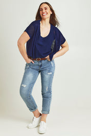 Model Jane wearing size L of The Short Sleeve Shrug in colour Clasicnavy (Blue), from the front, showing the whole outfit