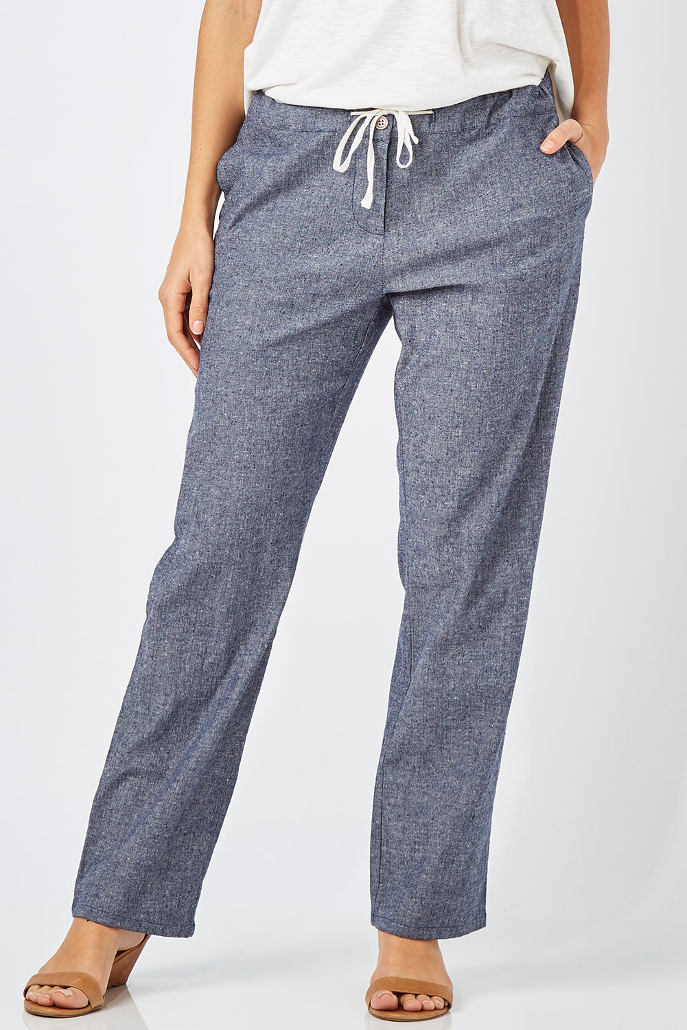 Model Anna wearing size 8 of The Drawstring Linen Pant in colour Navy (Blue), from the front, cropped image