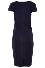Product shot of The Deep V Neck Dress in colour Navy (Blue), from the back