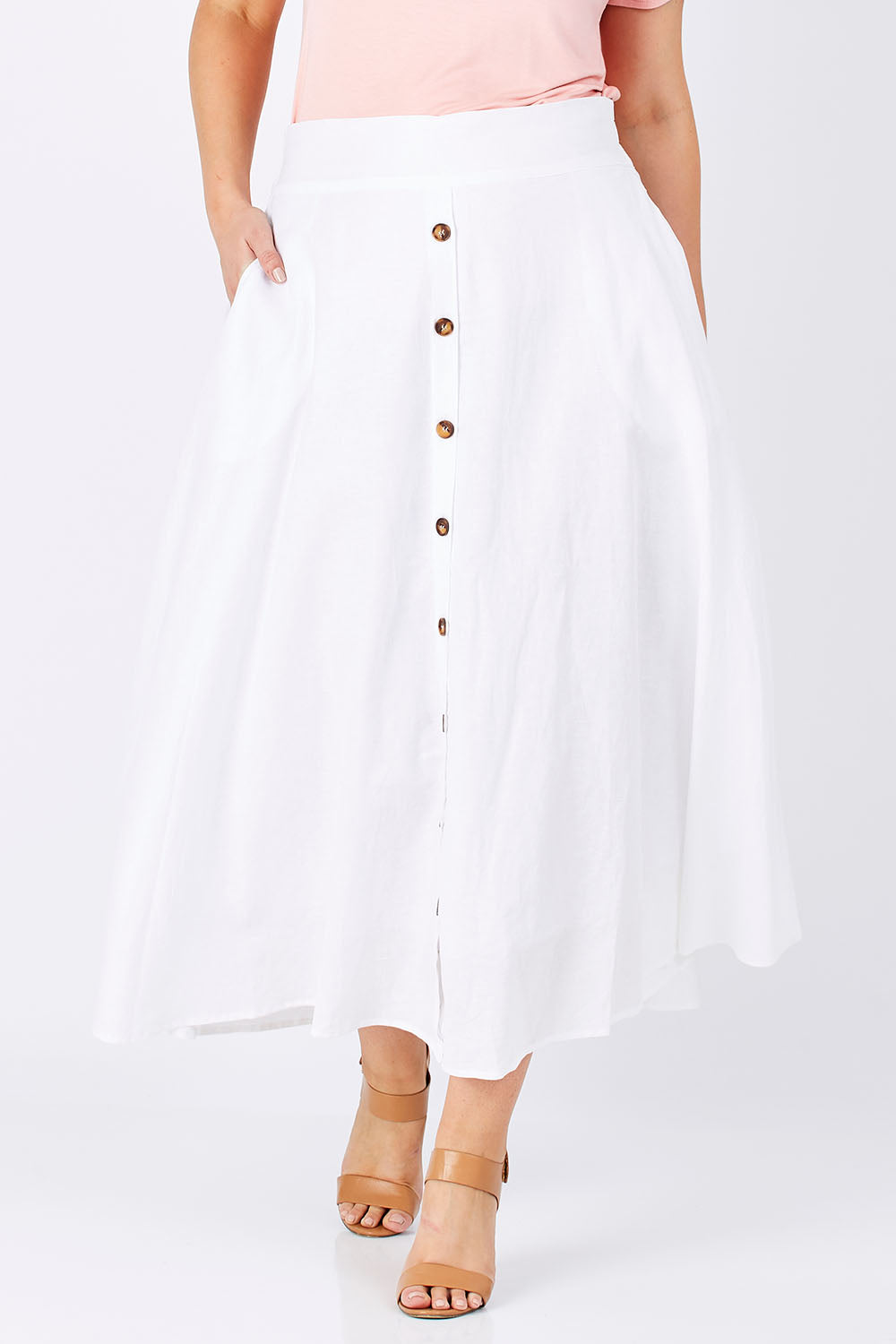 Model Jess wearing size 12 of The Button Up Midi Skirt in colour White (White), from the front, cropped image