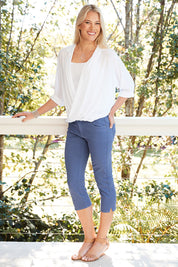 Model Denniel wearing size 10 of The 3/4 Stretch Jean in colour Blue (Blue), from the front, showing the whole outfit