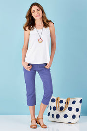 Model Helen wearing size 10 of The 3/4 Stretch Jean in colour Blue (Blue), from the front, showing the whole outfit