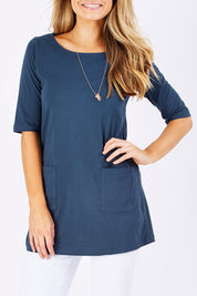 Model Marnee wearing size 10 of The Pocket Tunic Top in colour Navy (Blue), from the front, cropped image