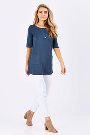Model Marnee wearing size 10 of The Pocket Tunic Top in colour Navy (Blue), from the front, showing the whole outfit