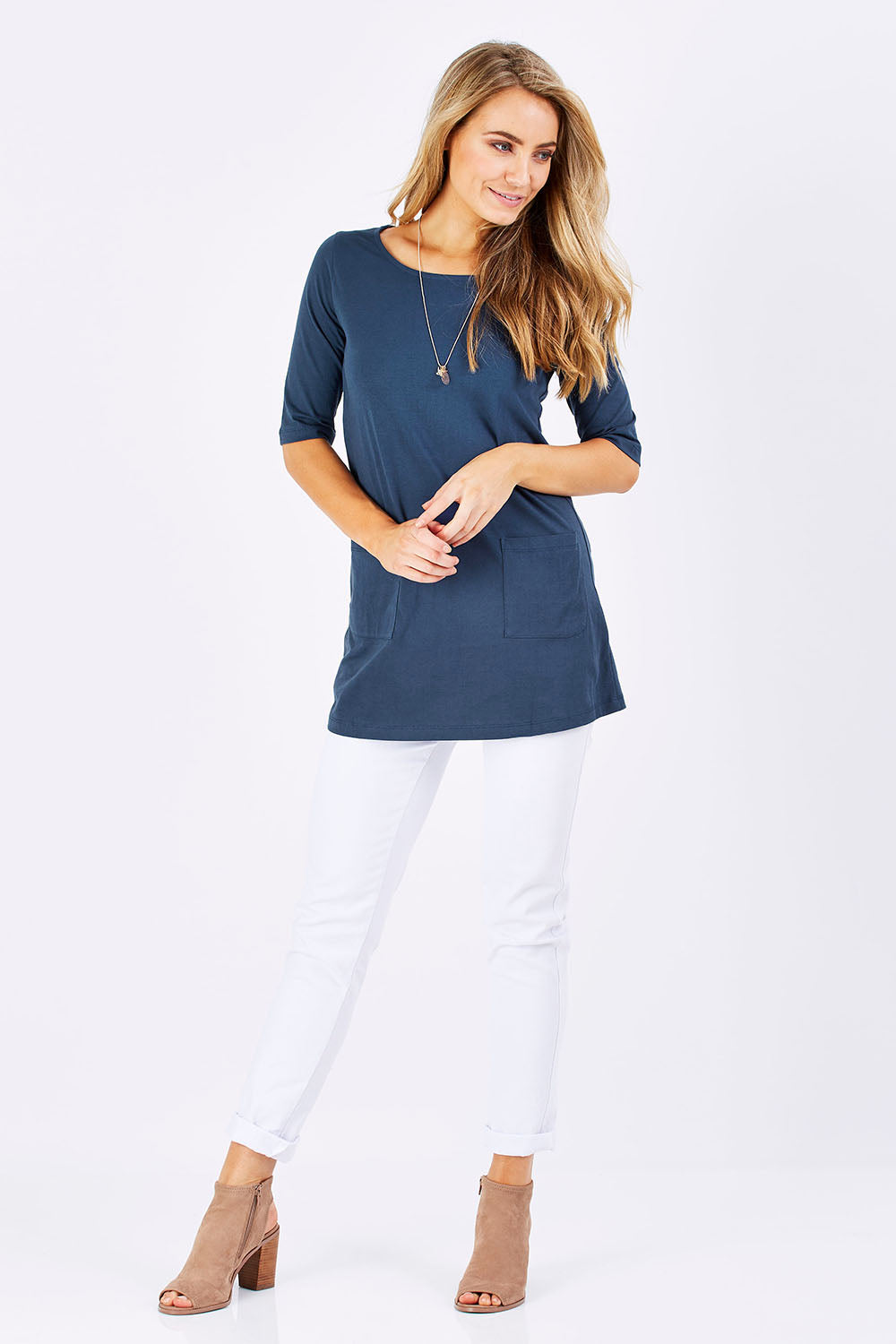 Model Marnee wearing size 10 of The Pocket Tunic Top in colour Navy (Blue), from the front, showing the whole outfit