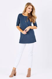 Model Marnee wearing size 10 of The Pocket Tunic Top in colour Navy (Blue), from the front, showing the whole outfit