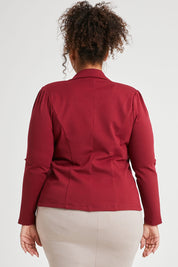 Model Alexis wearing size 16 of The Ponte Blazer in colour Wildberry (Red), from the front, cropped image