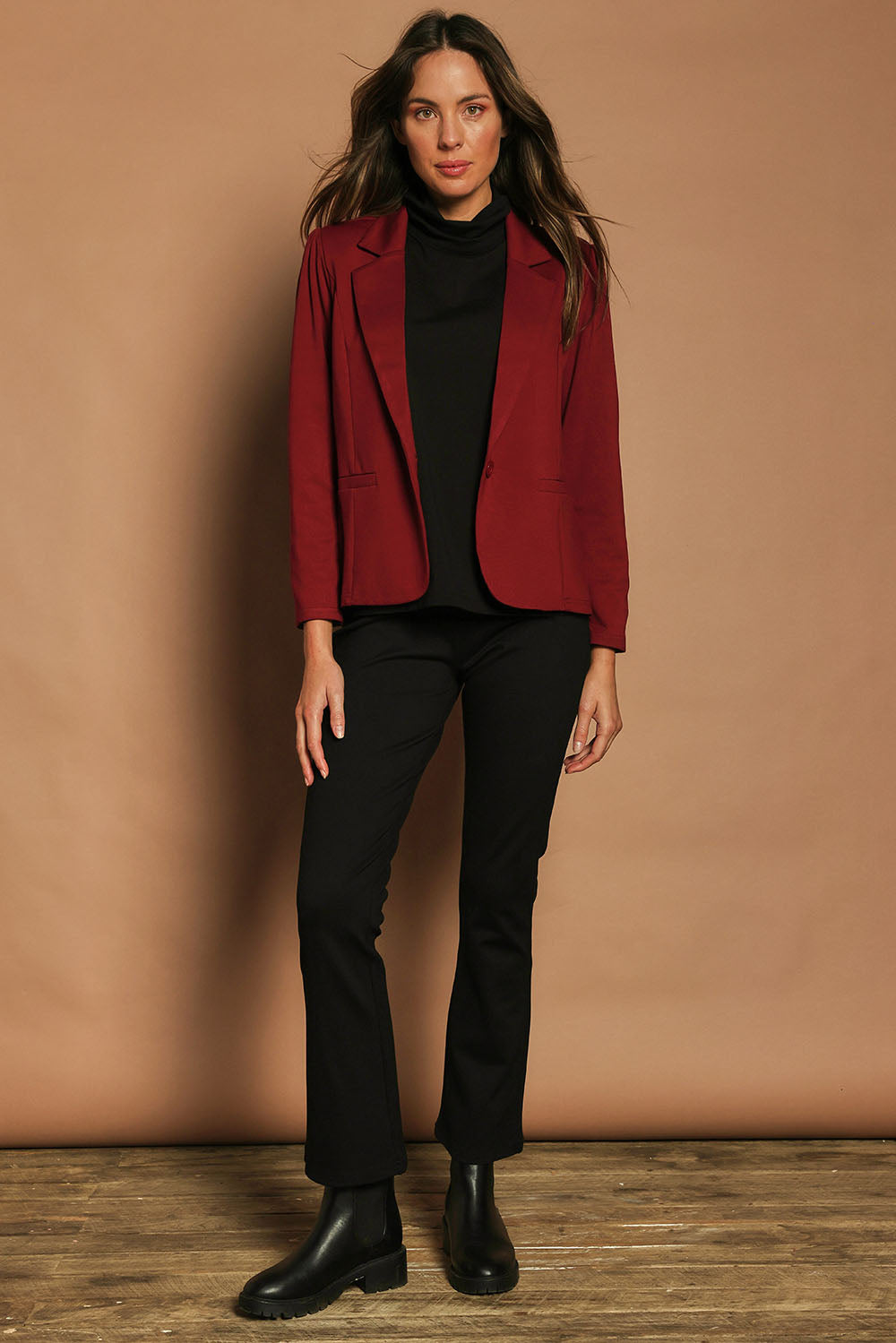 Model Madeline wearing size 10 of The Ponte Blazer in colour Wildberry (Red), from the front, showing the whole outfit