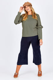 Model Fiona wearing size 16 of The Ruffle Sleeve Sweat in colour KhakiMarle (Green), from the front, showing the whole outfit