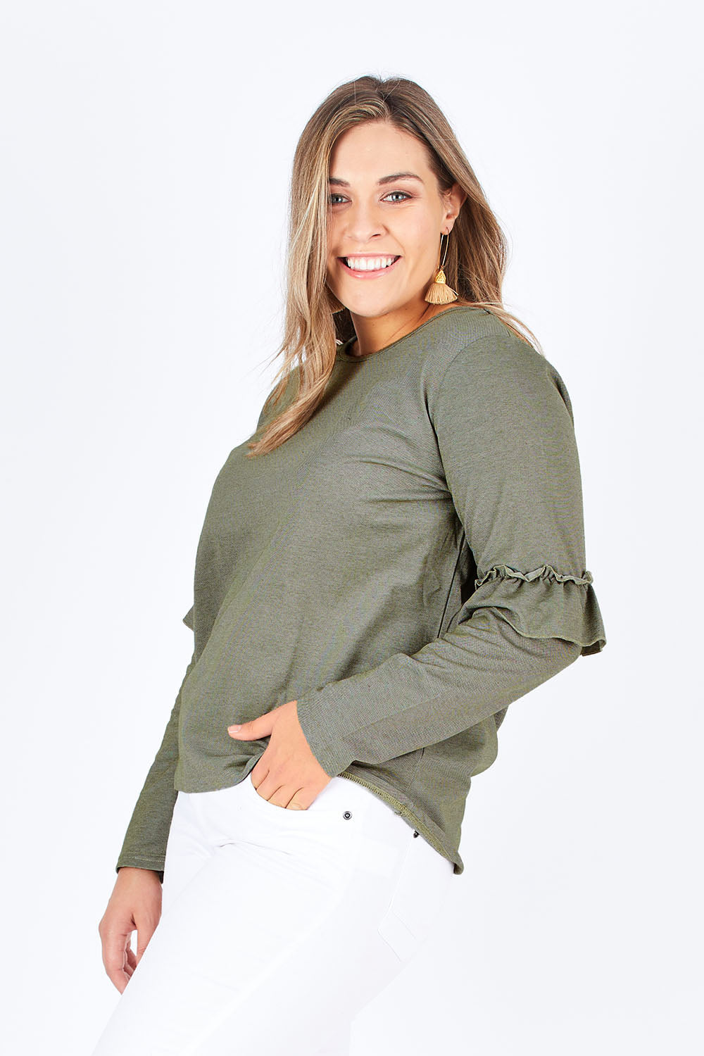 Model Natalia wearing size 14 of The Ruffle Sleeve Sweat in colour KhakiMarle (Green), from the front, cropped image