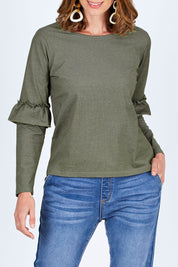 Model Riina wearing size 10 of The Ruffle Sleeve Sweat in colour KhakiMarle (Green), from the front, cropped image