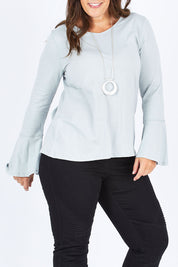 Model Stacey wearing size 12 of The Bell Sleeve Top in colour Grey (Grey), from the front, cropped image