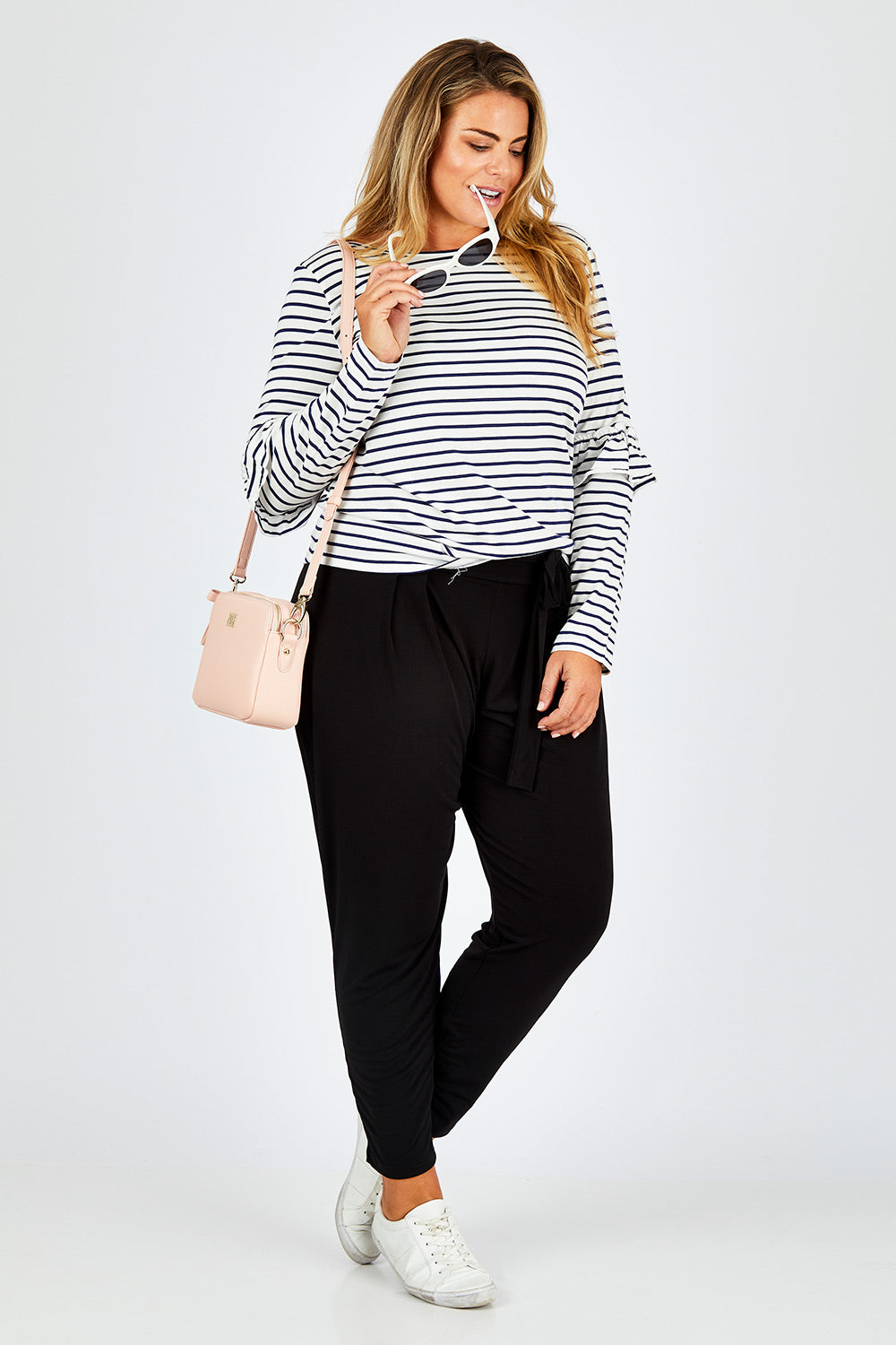 Model Fiona wearing size 16 of The Comfort Pant in colour Black (Black), from the front, showing the whole outfit