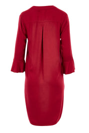Product shot of The Flute Sleeve Dress in colour Cherry (Red), from the back