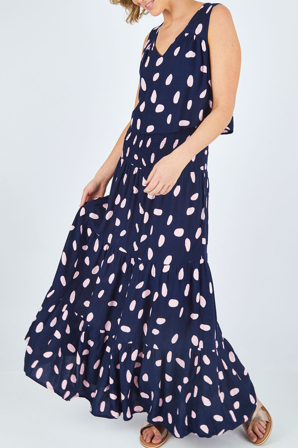 Model Chelsea wearing size 10 of The Overlay Maxi Dress in colour Spotprint (Blue), from the front, cropped image