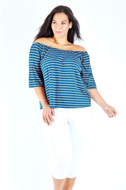 Model Lauren wearing size 18 of The Cotton Bamboo Free Shoulder Top in colour Bluegold (Blue), from the front, cropped image