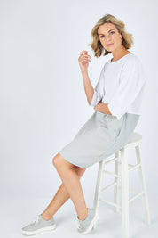 Model Chelsea wearing size 10 of The Spliced Shift Dress in colour Grey (Grey), from the front, showing the whole outfit