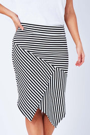 Model Laura wearing size 12 of The Contrast Striped Skirt in colour BlackWhite (Black), from the front, cropped image