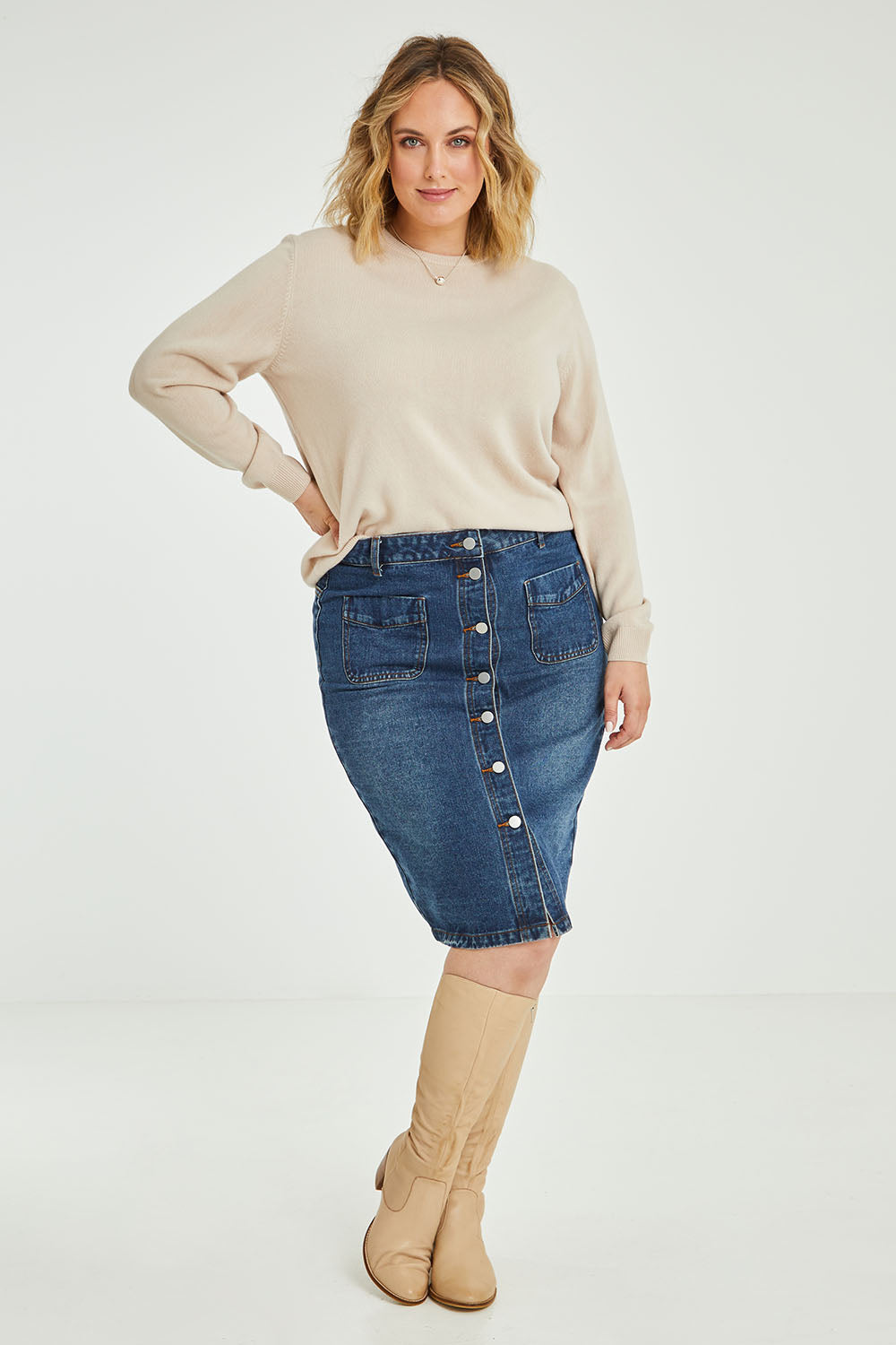 Model Jess wearing size 14 of The Midi Button Up Skirt in colour Darkdenim (Blue), from the front, showing the whole outfit