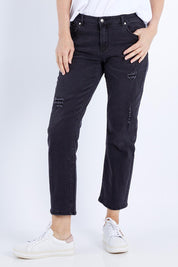 Model Veronica wearing size 10 of The Distressed Boyfriend Jean in colour Black (Black), from the front, cropped image