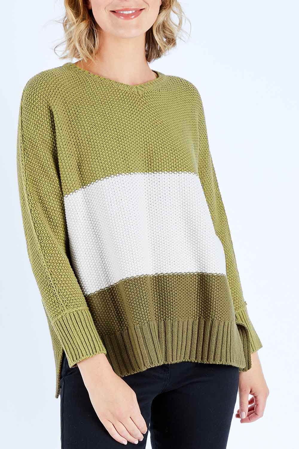 Model Chelsea wearing size S of The Drape Knit Jumper in colour Khaki (Green), from the front, cropped image