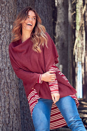 Model Laura wearing size 14 of The V Neck Hi Low Top in colour Redstripe (Red), from the front, showing the whole outfit
