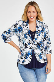 Model Jess wearing size 14 of The Everyday Printed Blazer in colour Bluefloral (Blue), from the front, cropped image
