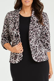 Model Laura wearing size 14 of The Everyday Printed Blazer in colour Mutedpink (Pink), from the front, cropped image