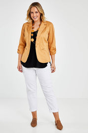 Model Jess wearing size 14 of The Everyday Blazer in colour Camel, from the front, showing the whole outfit