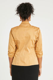 Model Noli wearing size 14 of The Everyday Blazer in colour Camel, from the back