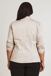 Model Ashleigh wearing size 16 of The Everyday Blazer in colour Stone, from the back