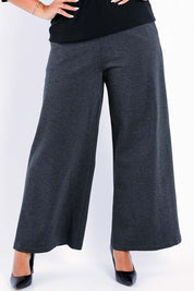 Model Sasha-Lee wearing size 16 of The Wide Leg Ponte Pant in colour Darkmarle (Grey), from the front, cropped image
