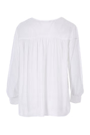 Product shot of The Luxe Dobby Blouse in colour White (White), from the back