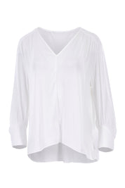 Product shot of The Luxe Dobby Blouse in colour White (White), from the front
