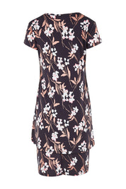 Product shot of The Printed Short Sleeve Rita Dress in colour Blooms (Grey), from the back