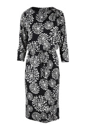 Product shot of The Lined Jersey Dress in colour Blooms (Black), from the front